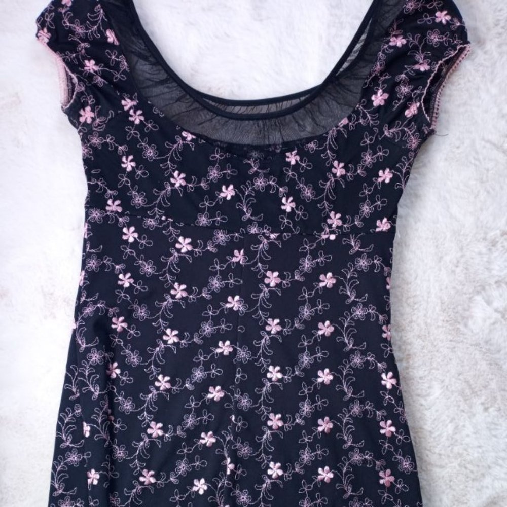 Black with pink embroidered flowers dress.